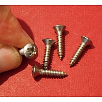 7" Headlamp Chrome Rim Retaining Screws  (Sold as a set of Four)   RTC465-SetA